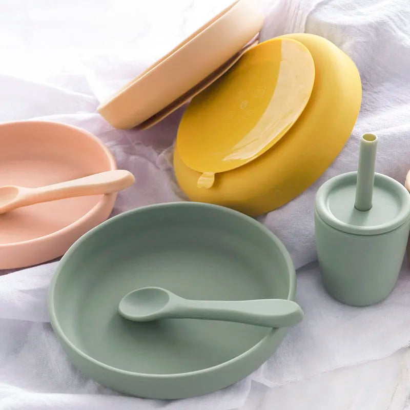 Compact silicone feeding bowl, BPA-free, perfect for travel with baby or toddler.