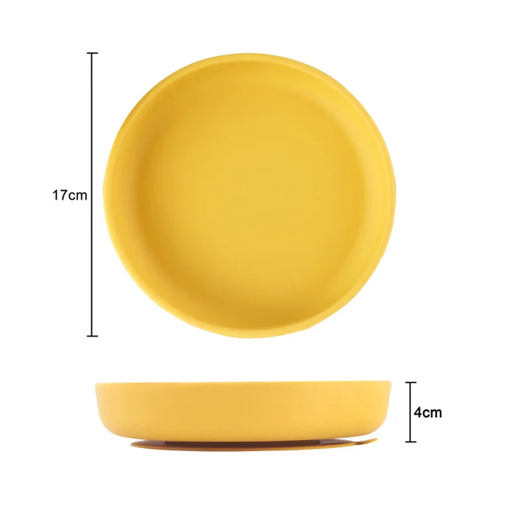Ergonomic silicone toddler bowl, BPA-free, helps little ones learn to self-feed.