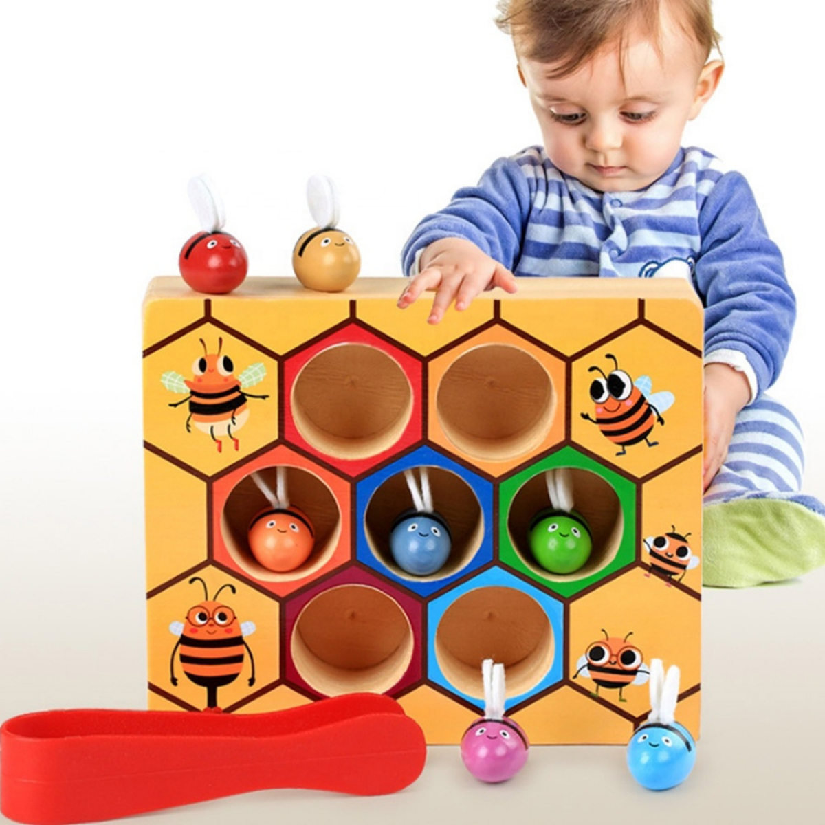 Educational beehive sorting game, vibrant colors to enhance fine motor skills