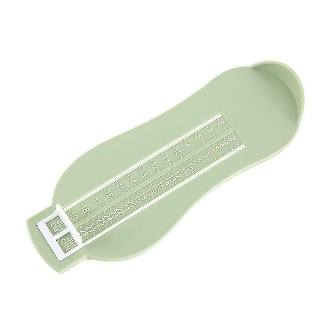 Portable children's shoe fitting tool for precise foot sizing, ensuring comfort and proper development.