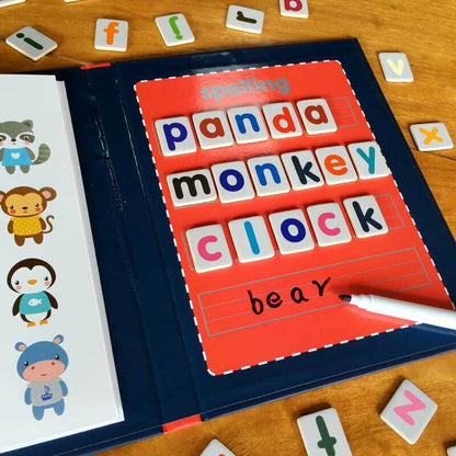 Toddler arranging colorful magnetic letters on a durable wooden learning board