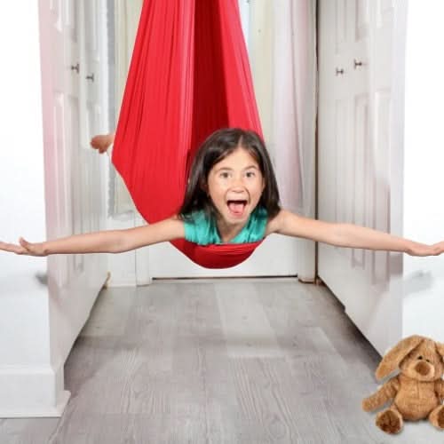 Cotton blend therapy swing for children, offering calming comfort, focus, and sensory support indoors.