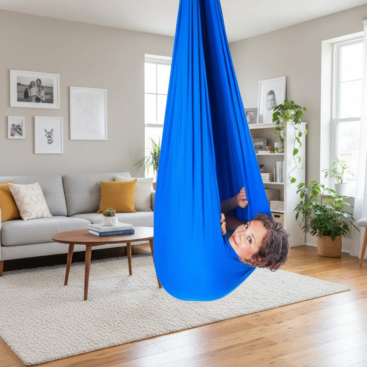 Durable cotton blend indoor sensory swing providing calming comfort for kids with special needs.