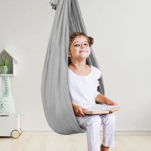 Indoor therapy swing creates a quiet, calming space for children to focus & process sensory input.
