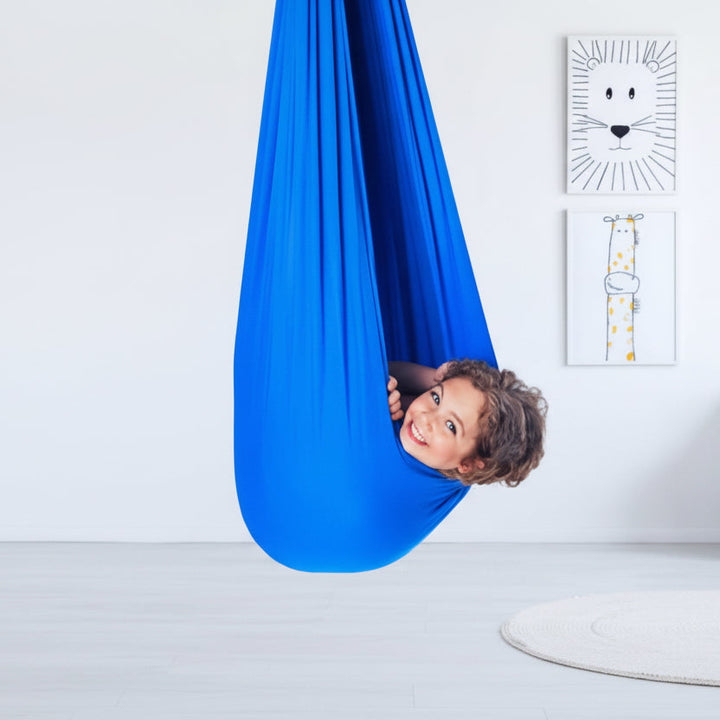 Comfortable children's therapy swing, fostering calm, focus, and healthy child development.