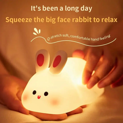 Toddler's cuddly animal night light, soft silicone, provides a gentle glow for a peaceful sleep