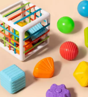 Colorful activity cube, a preschool sorting toy for kids to enhance motor skills and learning.