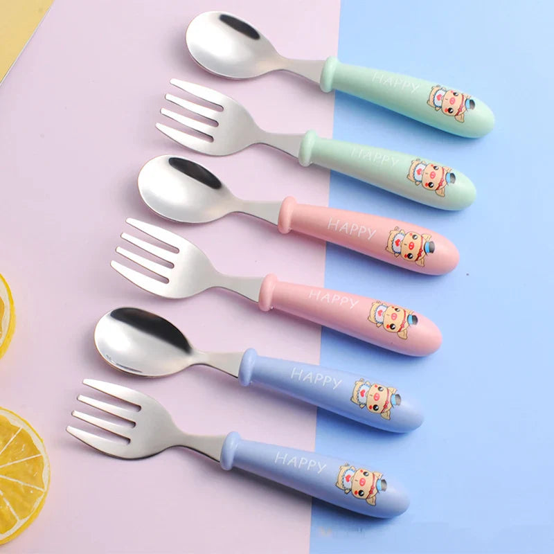 Toddler stainless steel fork and spoon kit with easy-grip handles, perfect for self-feeding