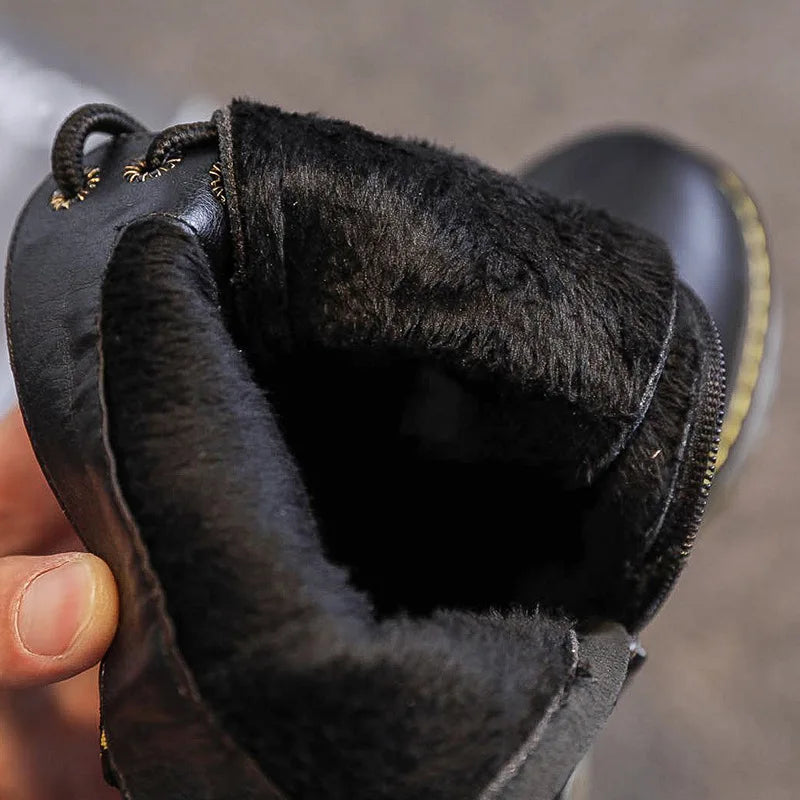 Black waterproof combat boots for children, insulated design, non-slip sole, perfect for outdoor winter play