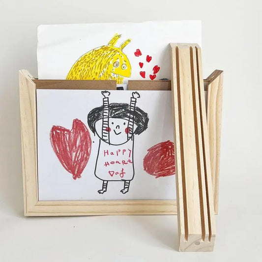 Children's wooden art display frame with swappable front, perfect for kid's crafts and home decor.