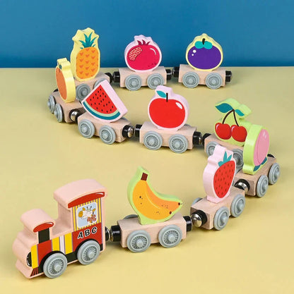 Overhead view of a wooden magnetic train layout, showing various tracks and a complete train set for creative play