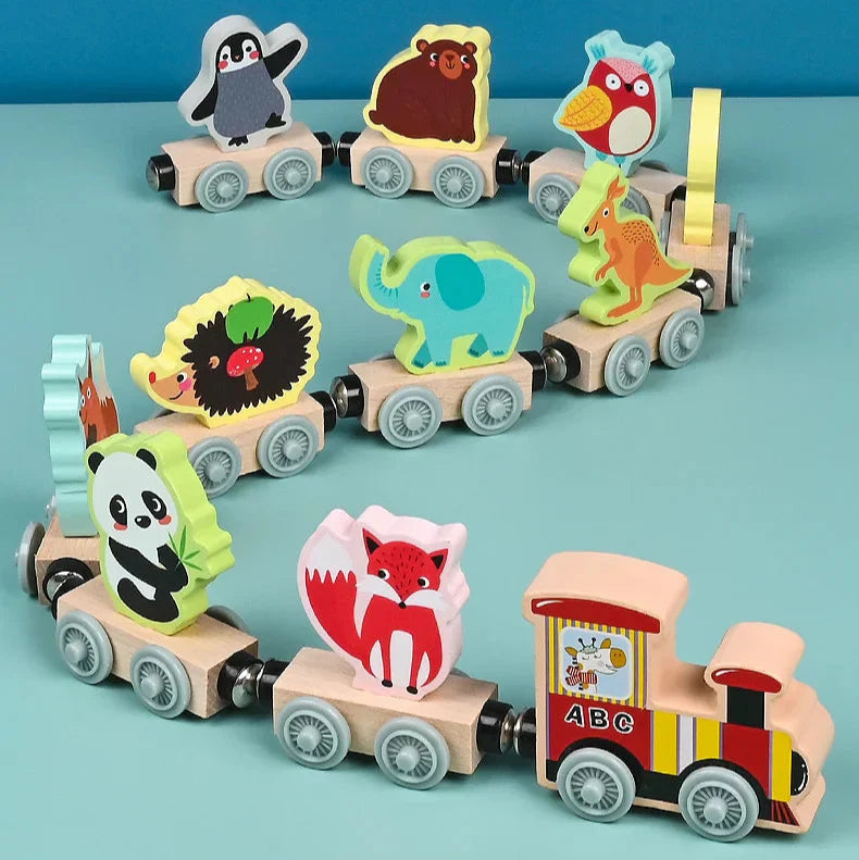 Child grasping a wooden magnetic train, demonstrating fine motor skill development and toddler play engagement