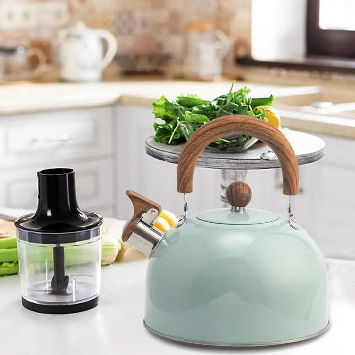 Durable classic 3-quart stovetop whistling kettle, perfect for boiling water for tea time. Modern kitchenware.