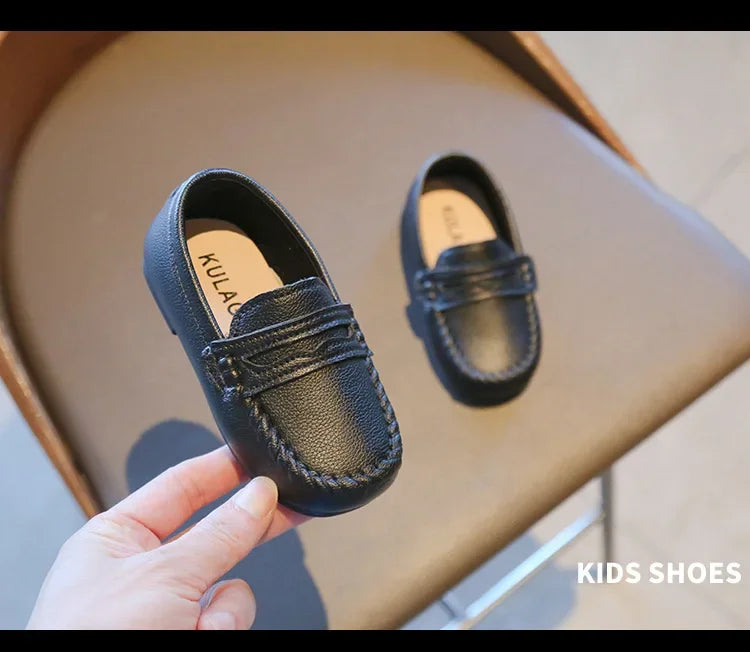 Unisex black leather slip-on formal loafers, perfect for school picture days and special events.