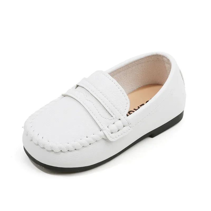 Boys' black leather slip-on dress shoes, suitable for school, weddings, and formal outings.