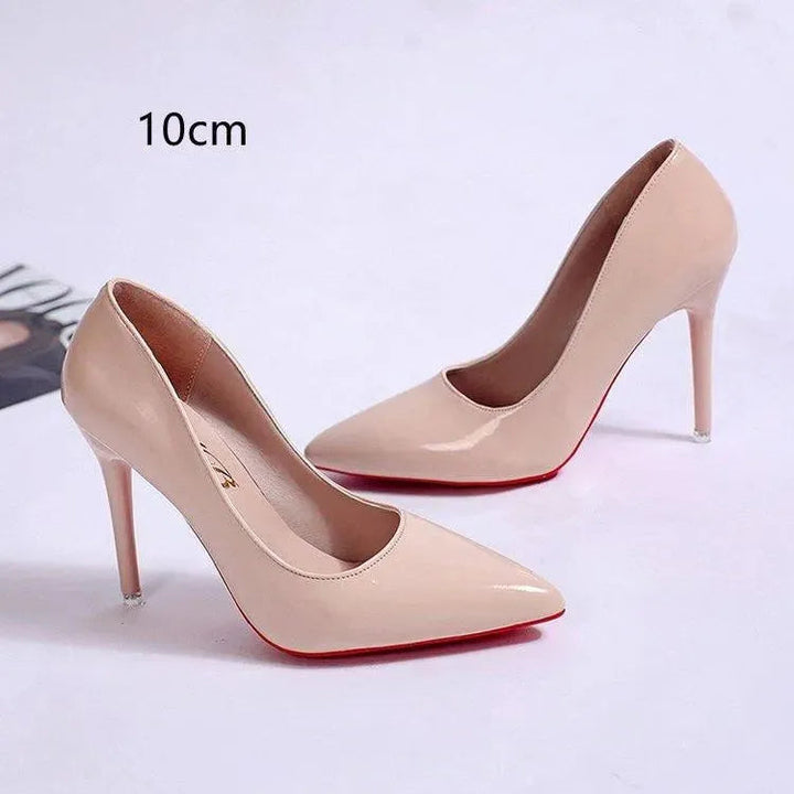 Sleek black pointed toe stiletto pumps. Women's elegant high heels for any occasion.