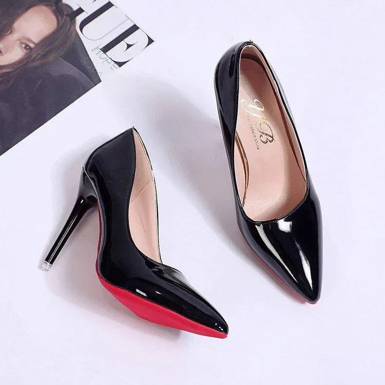Chic pink stiletto high heels on foot. Pointed toe party pumps for women.