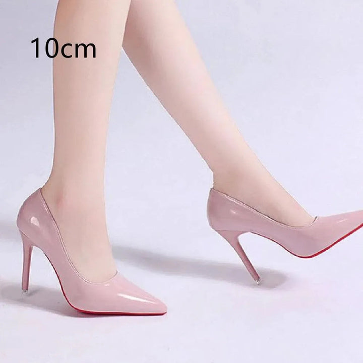 Close-up of apricot stiletto pumps, pointed toe. Elegant women's high heels, versatile.