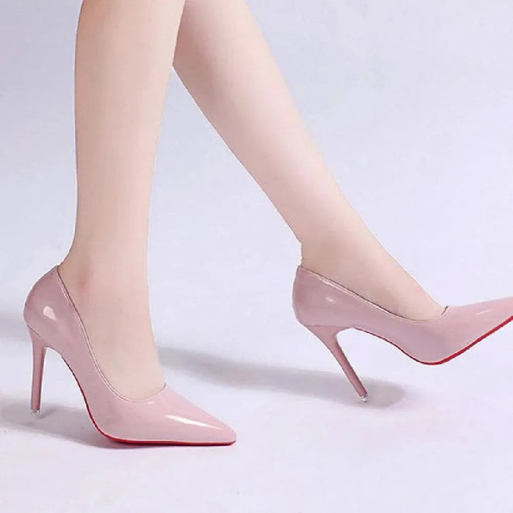 Stylish black stiletto pumps for women's office wear. Pointed toe, comfortable high heels.