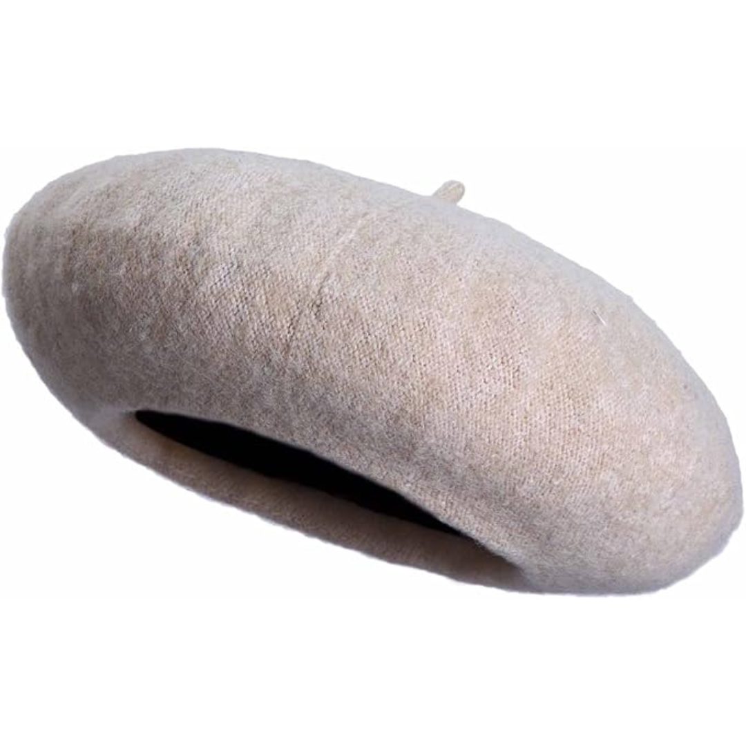 Stylish women's beret in mustard yellow, a classic French headwear for autumn.