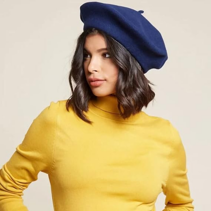 Grey women's classic beret, a sophisticated and warm headwear for winter.