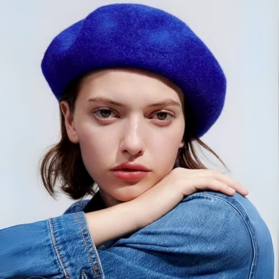 Woman wearing a stylish black French beret, an elegant classic headwear.