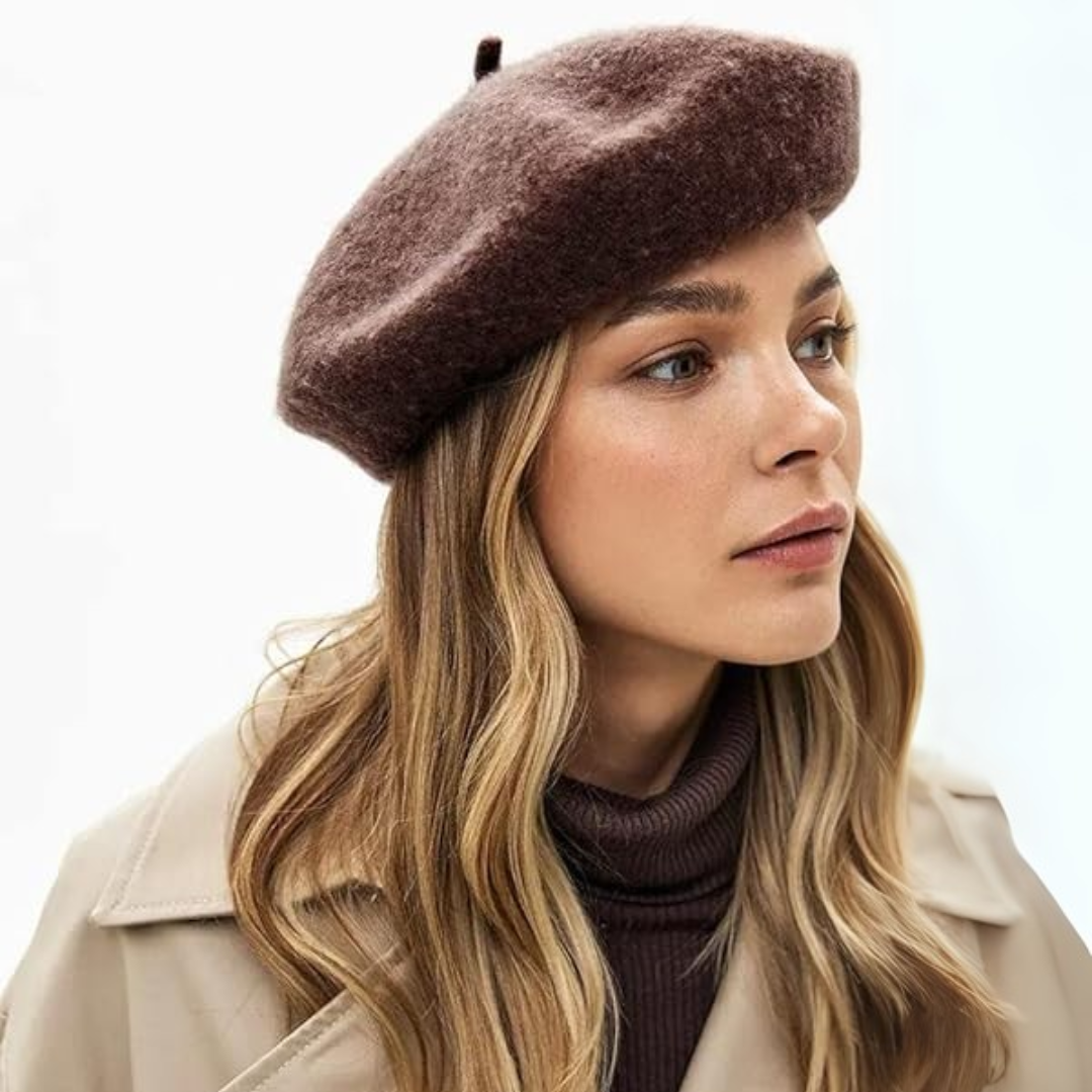 Close-up of a soft wool women's French beret hat, showing classic texture.