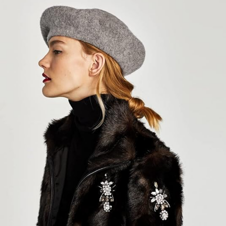 Timeless blue women's French beret, a classic stylish headwear for any elegant outfit.