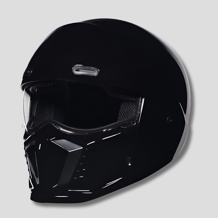 Full face motorcycle helmet with anti-scratch visor. Offers clear vision & protection for riders.