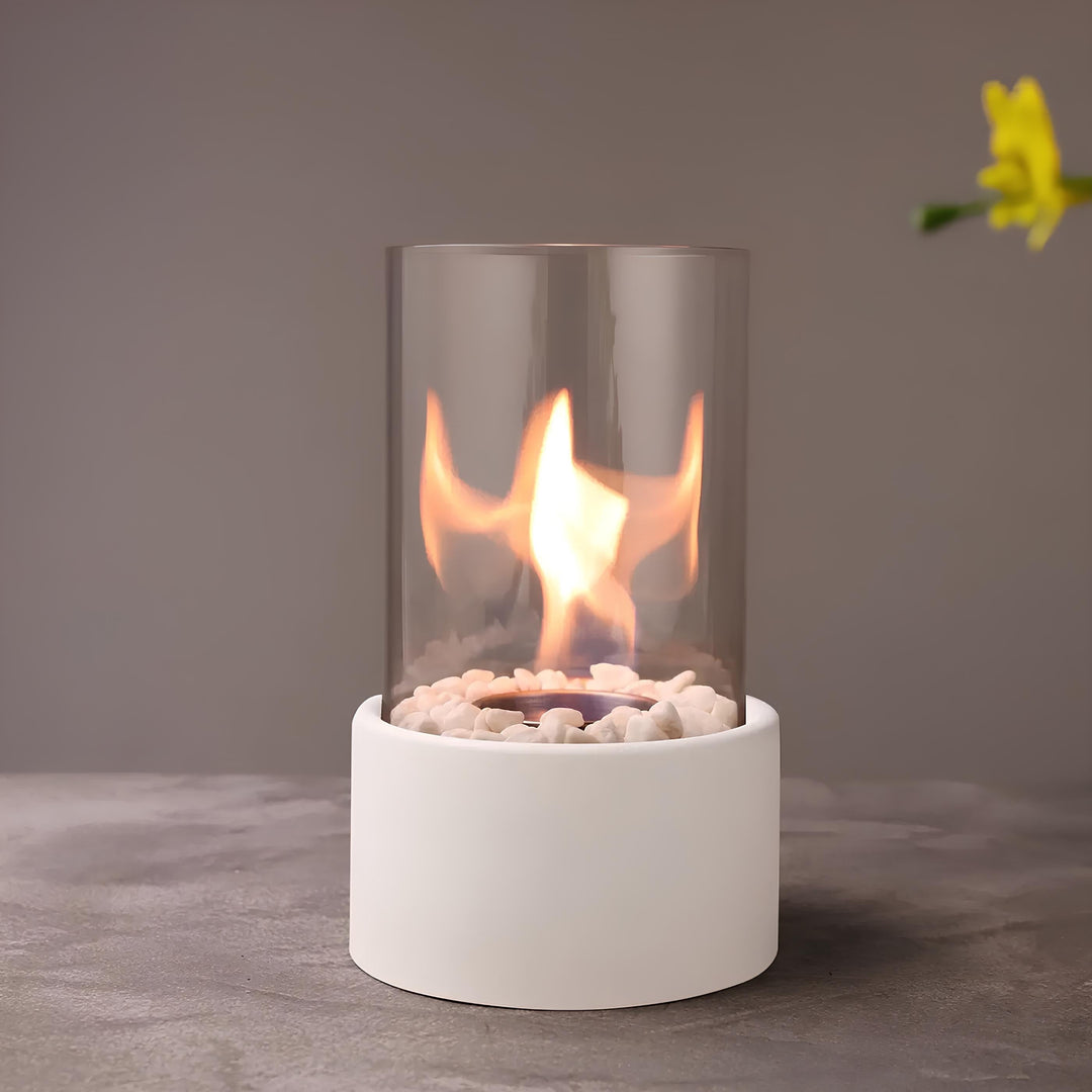 Tabletop oil lamp, timeless design, combines glass and metal for elegant decor.