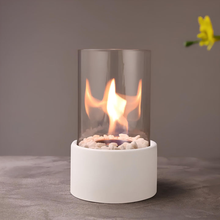 Tabletop oil lamp, timeless design, combines glass and metal for elegant decor.