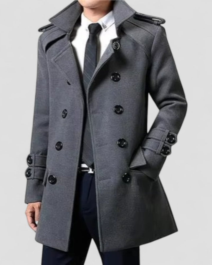 Stylish men's mid-length double-breasted trench coat. Perfect tailored outerwear for smart casual or business attire.