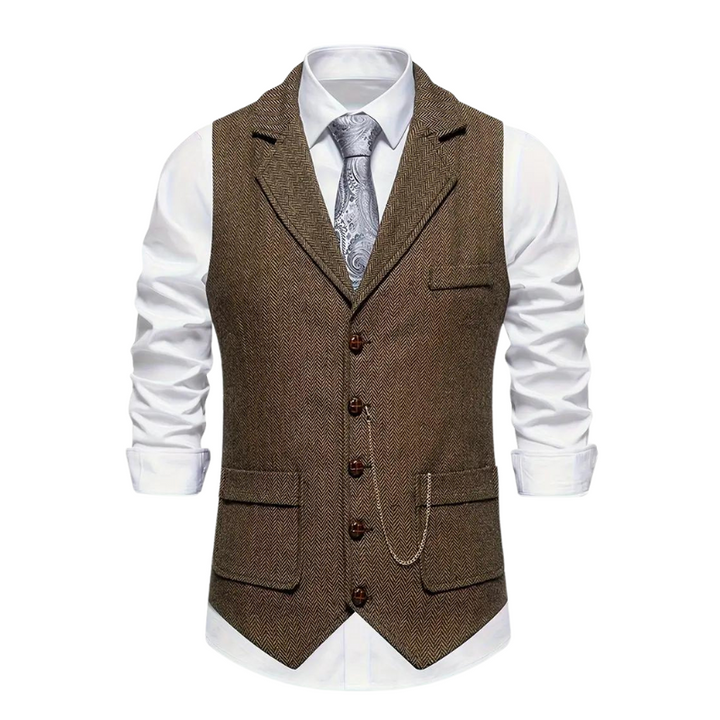 Classic men's herringbone waistcoat for refined style. Perfect for formal and casual chic looks.