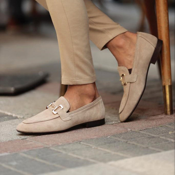 Classic men's horsebit slip-on loafers, offering polished comfort. Versatile for formal, casual, & smart casual looks.