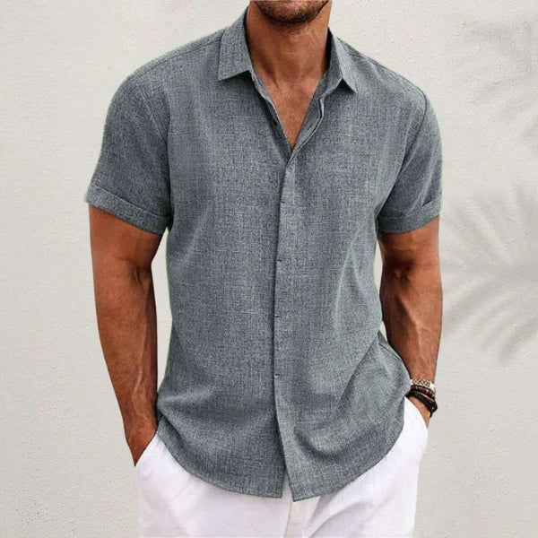 Stylish men's short-sleeve button-down shirt. Perfect for a minimalist, casual summer look.