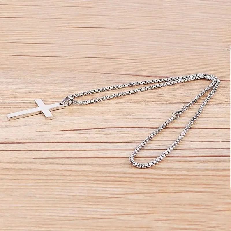 Timeless Men's Gold Cross Pendant Necklace. A versatile men's fashion accessory, ideal for formal occasions or daily spiritual wear.