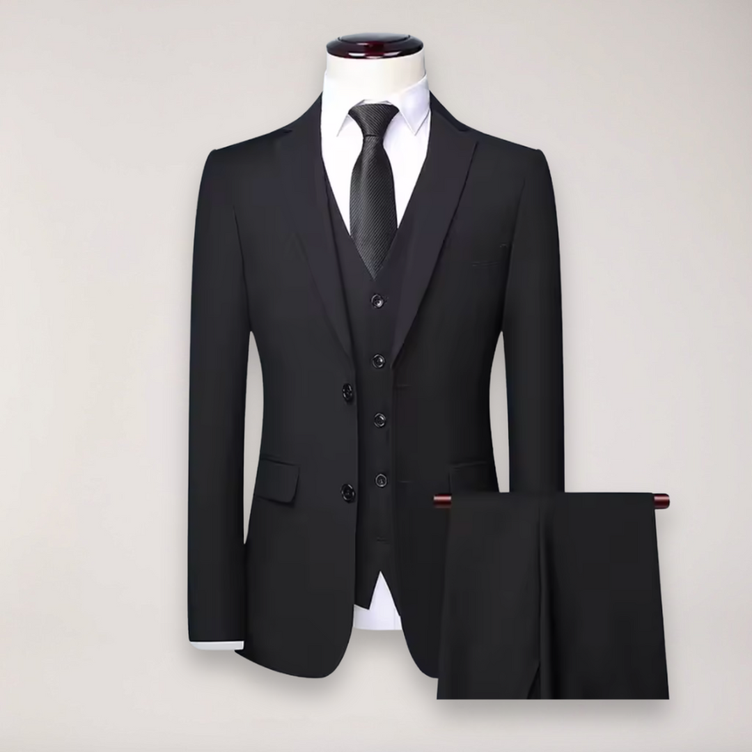 Men's formal wedding suit featuring a sophisticated three-piece design with blazer, vest & pants.