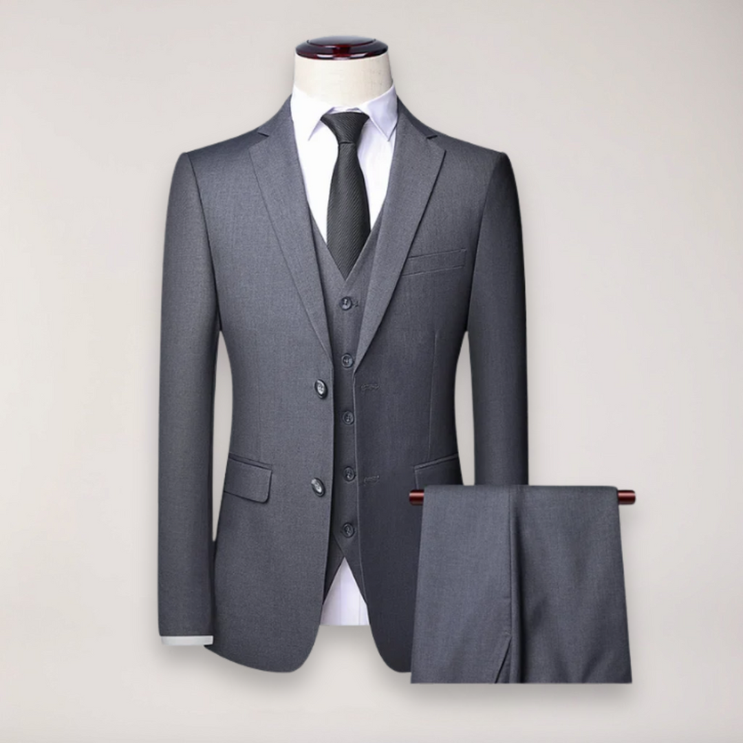 High-quality men's three-piece suit for formal occasions, featuring a blazer, vest & trousers.