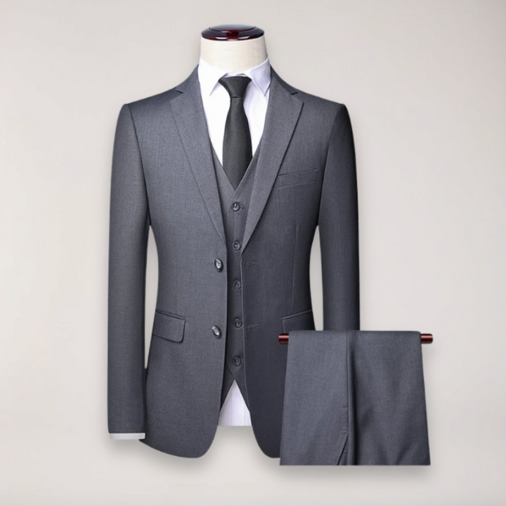 High-quality men's three-piece suit for formal occasions, featuring a blazer, vest & trousers.