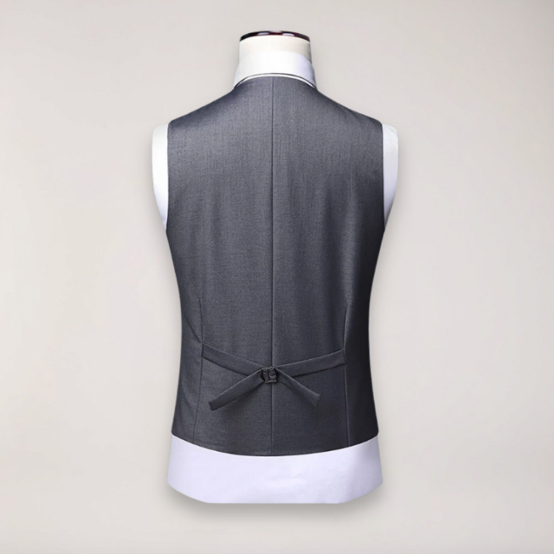 Formal men's suit: A sophisticated three-piece with a blazer, vest, and trousers for special events.