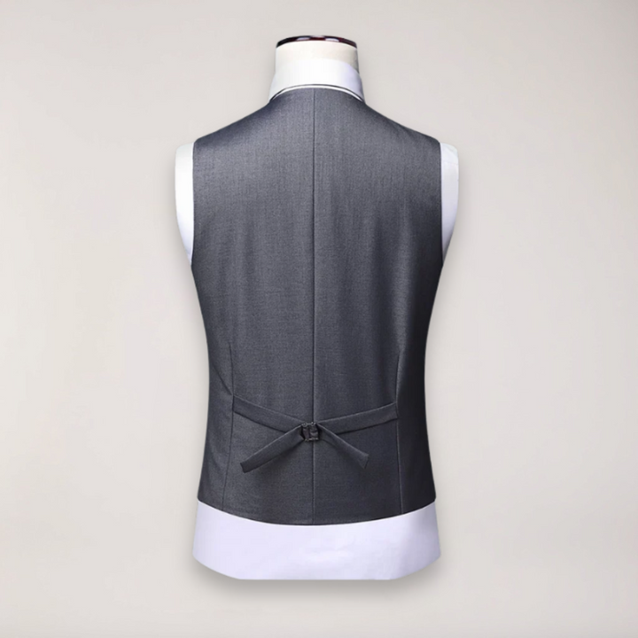 Formal men's suit: A sophisticated three-piece with a blazer, vest, and trousers for special events.