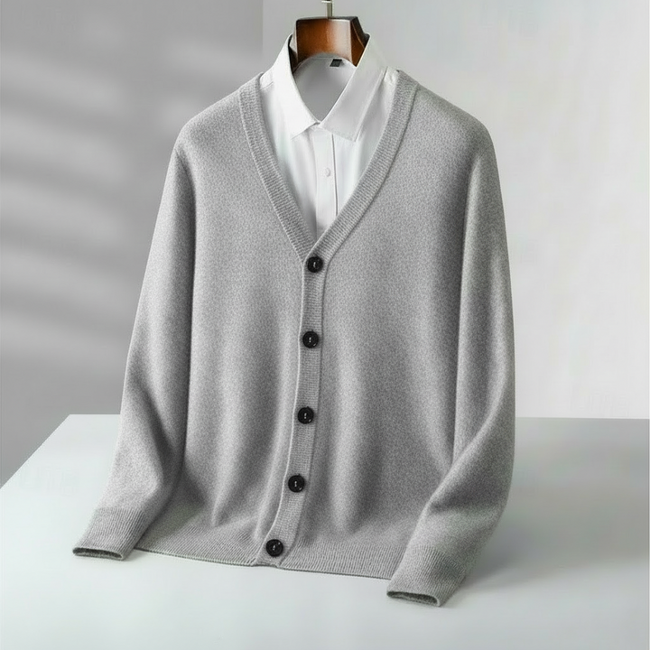 Men's classic v-neck knit cardigan. Ideal for smart casual layering, featuring a comfortable relaxed fit and year-round style.