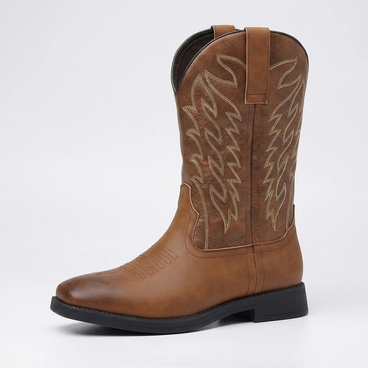 Iconic men's Western cowboy boots. Calf-length design with classic embroidery, durable slip-on fit & robust block heel.