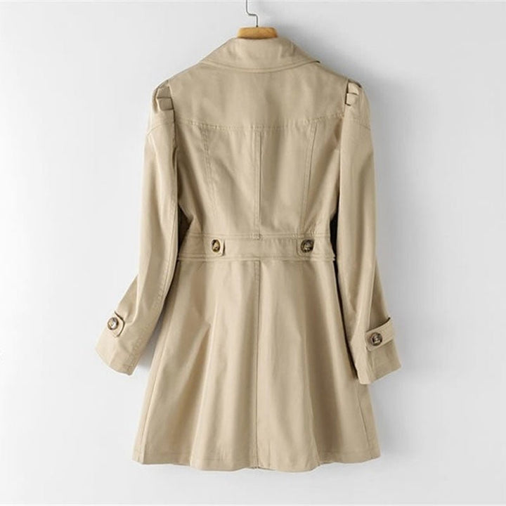 Timeless women's trench coat, classic style, tailored for an elegant workwear look.