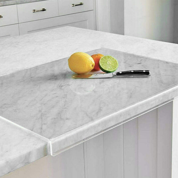 Clear acrylic cutting board with non-slip feet for safe kitchen food prep and stylish modern serving.