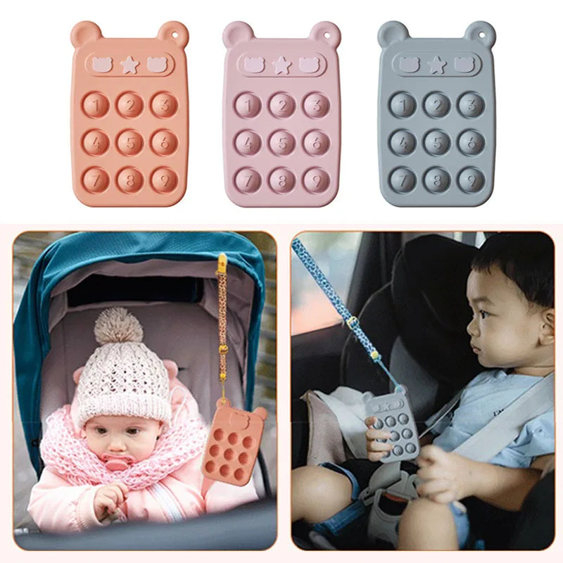Gender-neutral green silicone fidget phone teether, a safe and engaging educational toy for toddlers.