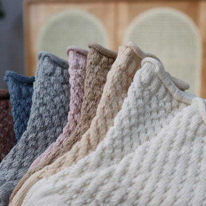 Package of multiple pairs of children's cotton mesh breathable ankle socks, ready for sale.