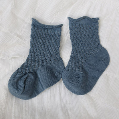 A pair of blue kids soft cotton mesh breathable ankle socks, perfect for baby clothing.