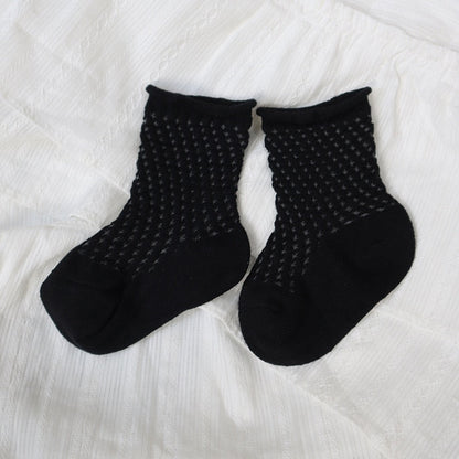 Styled image of a baby's outfit featuring adorable soft cotton mesh ankle socks.