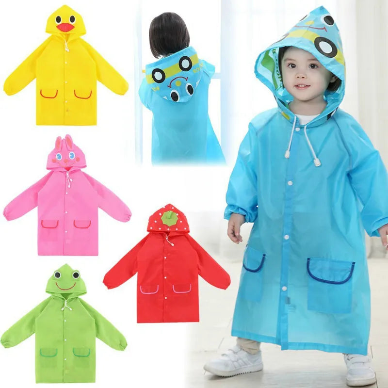Close-up of a smiling child in a yellow duck cartoon animal raincoat for outdoor play.